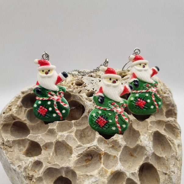 Plata de Ley Pendientes y/o Collar Papá Noel en Saquito Navideño